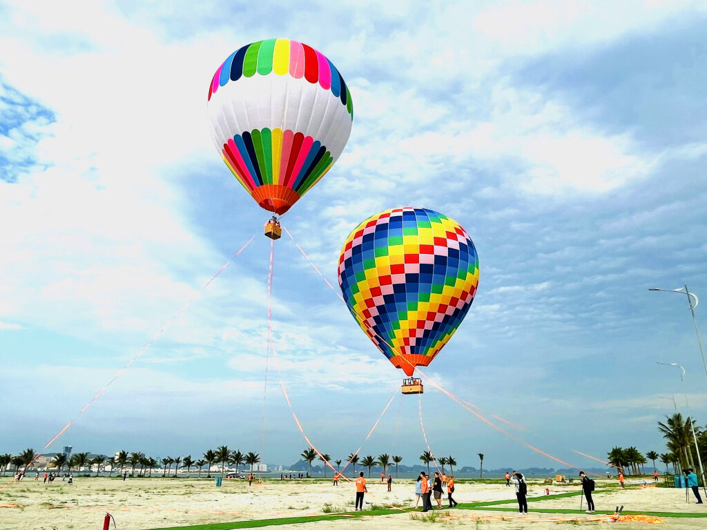 Drift above emerald waters on your exclusive Vietnam Tours